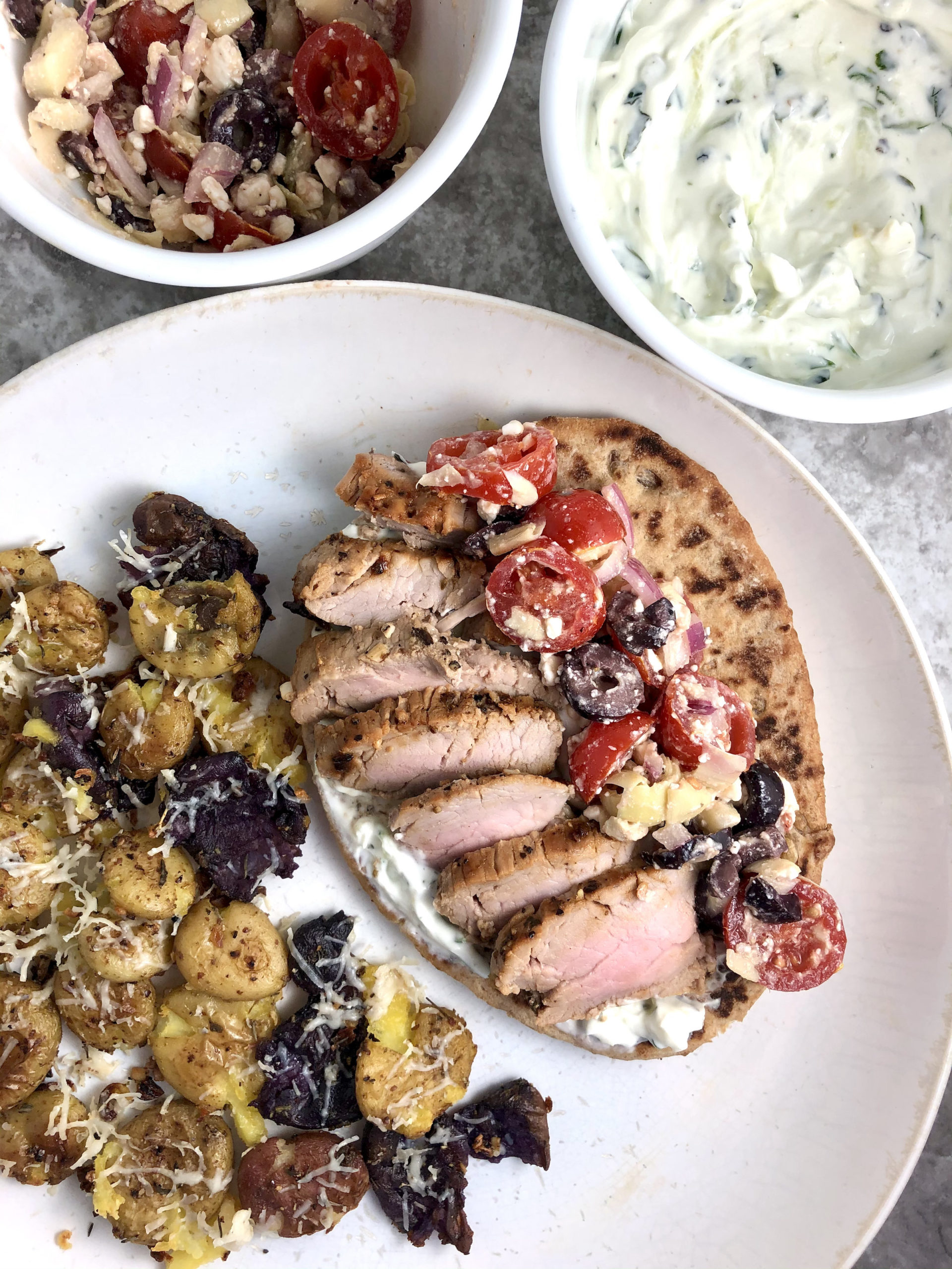 Greek Pork Tenderloin Pitas with Tzatziki and Tomato Feta Salad MAK